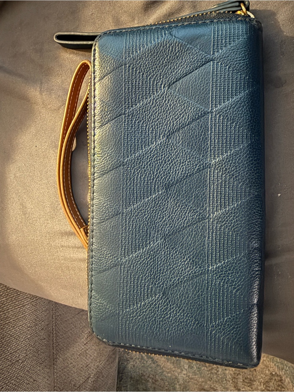Fossil wallet and fossil wristlet clip